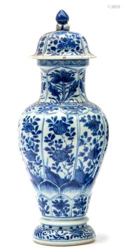 A blue and white covered vase