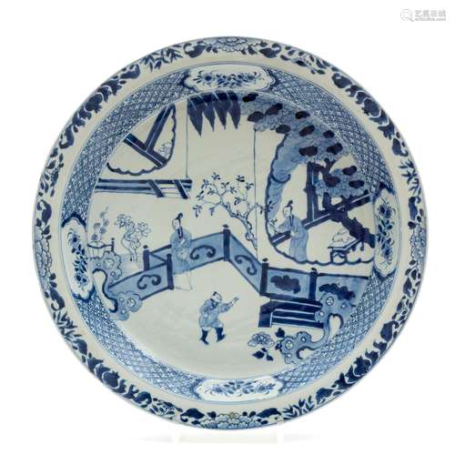 A large blue and white charger dish