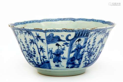 A blue and white bowl with figures