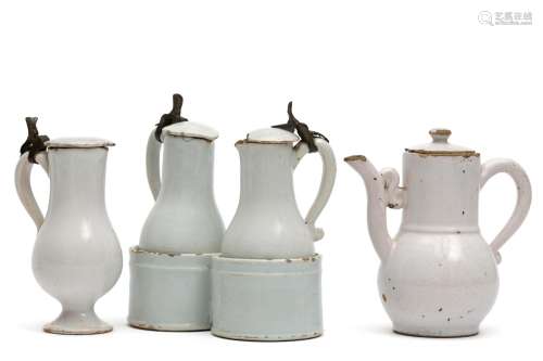 A white Delft cruet, a small jug and coffee pot
