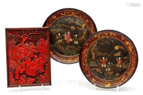 A red lacquer plaque and two dishes