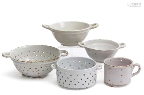 A white Delft collection of colanders and strainers