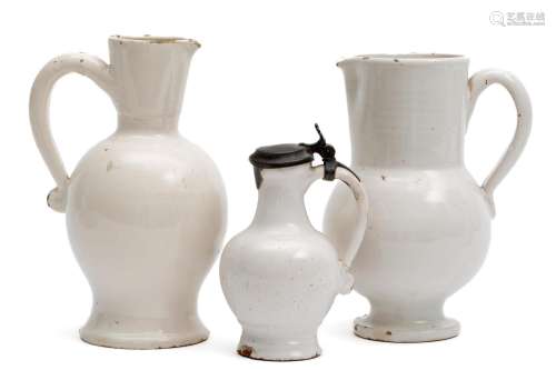 Three white faience Delft style jugs