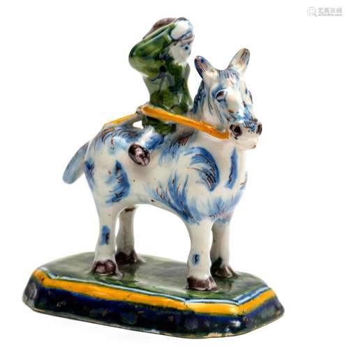 A small Delft pottery figure of a man on a horse