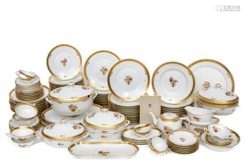 A Royal Copenhagen 'Golden Basket' porcelain dinne...