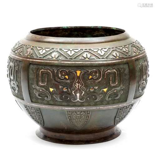 A large inlaid bronze archaic style cachepot