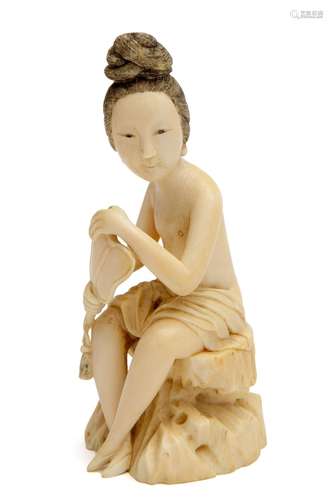 A rare carved ivory erotic figurine