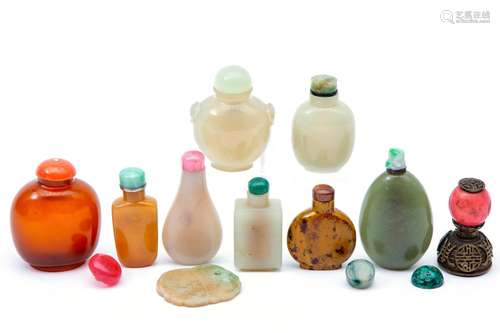 A collection of various snuff bottles