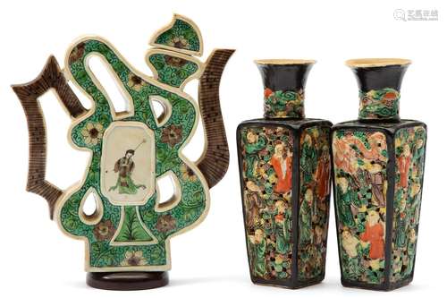 A Chinese biscuit Shou form-teapot and two openwork vases