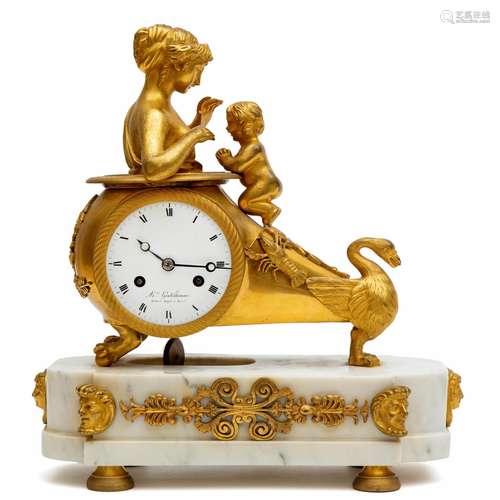 An Empire ormolu and white marble mantle clock