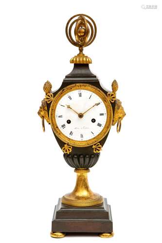 An Empire ormolu and patinated bronze mantle clock