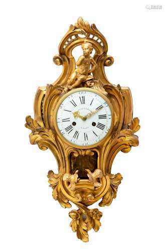 A large Louis XV ormolu cartel clock