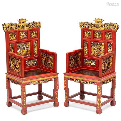 A pair of Chinese carved red-painted and parcel-gilt armchai...