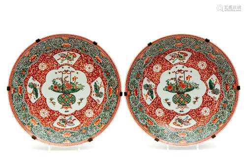 A pair of famille verte flower basket wall chargers