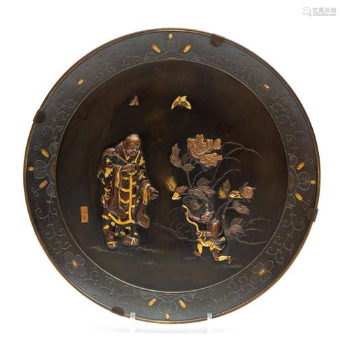 A large mixed metal wall plate, signed Yoshiyuki