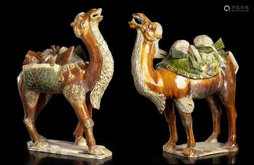 TWO SANCAI GLAZED CERAMIC SCULPTURES OF CAPARISONED