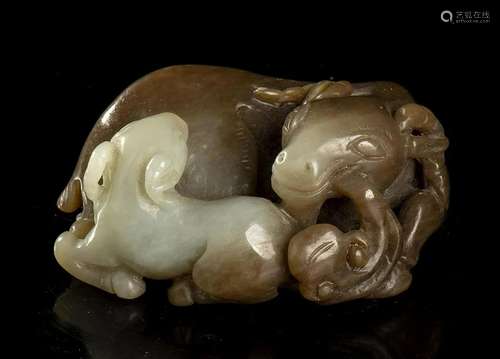 A JADE CARVING OF TWO RAMS China, 20th century