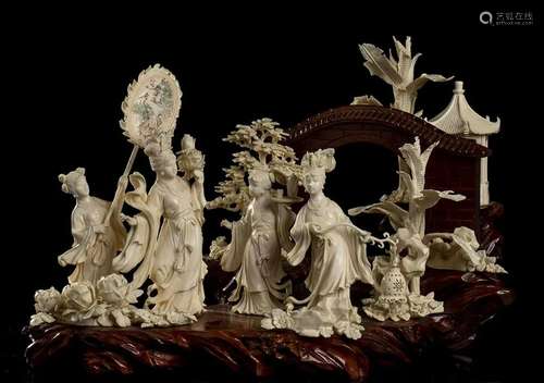 AN IVORY AND WOOD GROUP WITH FEMALE FIGURES China,