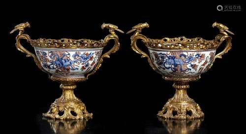 A PAIR OF OVERDECORATED IN EUROPE PORCELAIN BOWLS WITH