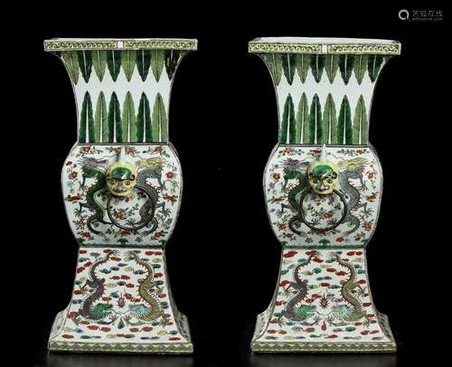 A PAIR OF LARGE PORCELAIN VASES WITH POLYCHROME