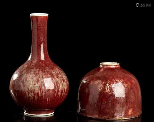 A RED GLAZED PORCELAIN BOTTLE AND A BEEHIVE WATERPOT