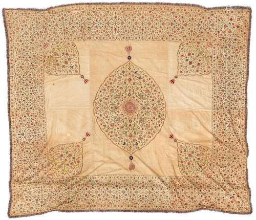 An Indo-Persian bed cover, embroidered silk on cotton