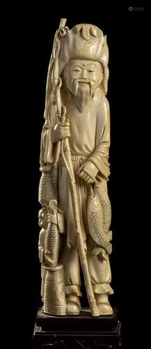 AN IVORY DEITY WITH CHILD China, early 20th century