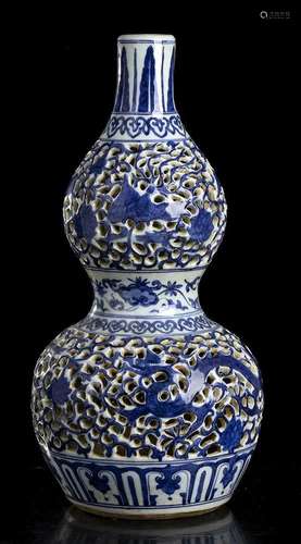 A 'BLUE AND WHITE' AND RETICULATED PORCELAIN DOUBL...