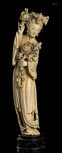 AN IVORY FEMALE FIGURE China, early 20th century