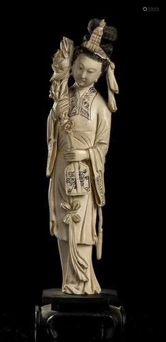 AN IVORY FEMALE FIGURE China, early 20th century