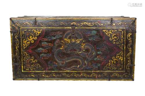 A CARVED AND PAINTED WOOD CHEST Tibet, 20th century