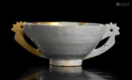 A WHITE GLAZED AND GOLD-RESTORED PORCELAIN HANDLED BOWL