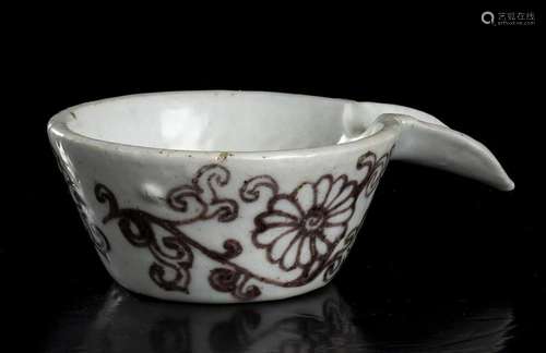 A WHITE GLAZED AND COPPER RED DECORATED PORCELAIN