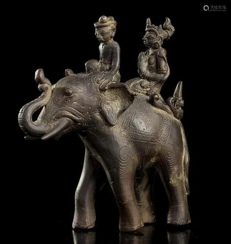 A BRONZE SCULTURE WITH TWO FIGURES ON AN ELEPHANT