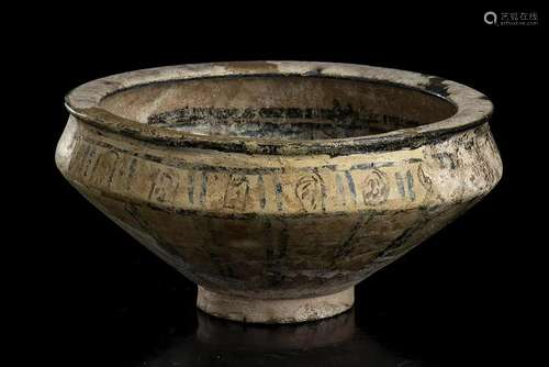 A LARGE PAINTED CERAMIC BOWL Iran, 13th-14th century