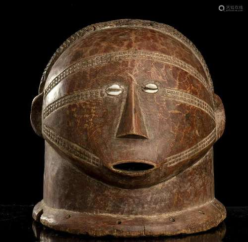 A WOOD AND COWRIE-SHELLS MASK, MUSANGWE Democratic