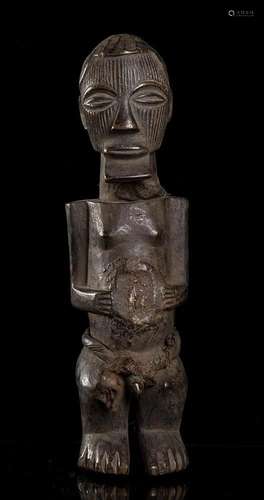 A WOOD FETISH FIGURE Africa