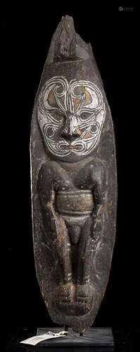 A WOOD ANTHROPOMORPHIC SCULPTURE Papua New Guinea,