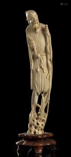 AN IVORY FIGURE China, early 20th century