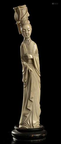 AN IVORY FEMALE FIGURE China, early 20th century