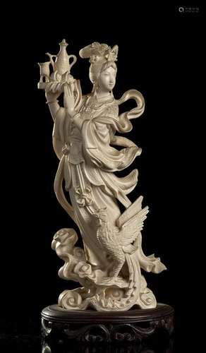 AN IVORY FEMALE DEITY China, early 20th century