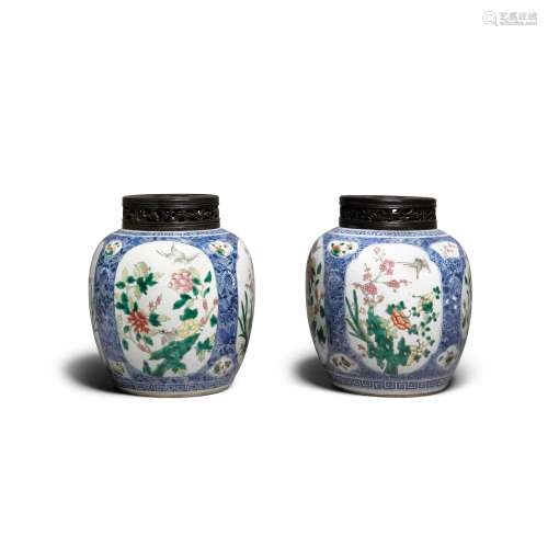 A pair of famille-rose and underglaze blue 'bird and flower'...