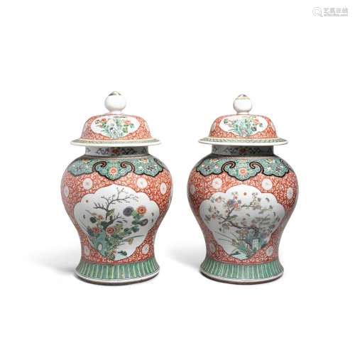 A pair of large famille-verte covered jars