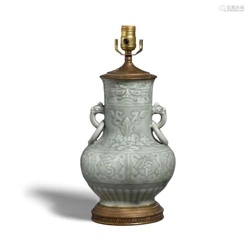 A celadon-glazed vase, now mounted as a lamp