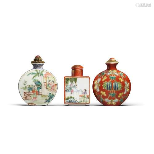 Three gilt and enameled snuff bottles