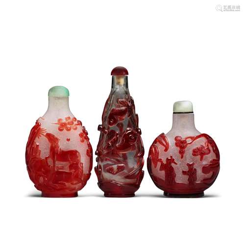 Three red overlay glass snuff bottles