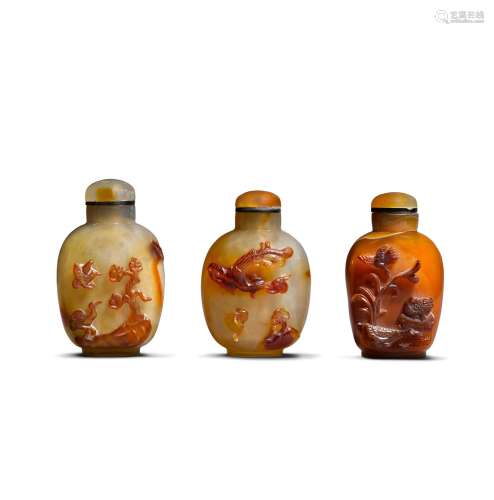 Three carved agate snuff bottles