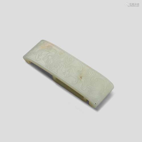 A carved white jade belt slide