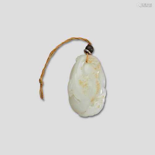 A carved white jade pendant
