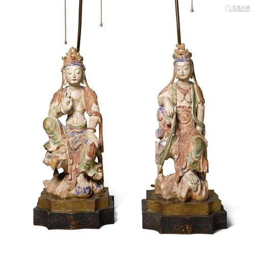 A pair of polychrome-painted wood bodhisattvas, now mounted ...